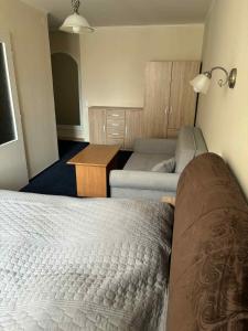 Postel nebo postele na pokoji v ubytování Hotel Alster