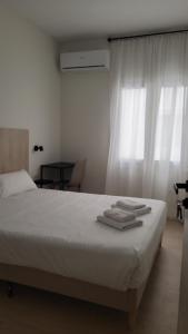 Posteľ alebo postele v izbe v ubytovaní CASA MILA SV guesthouse