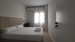 Posteľ alebo postele v izbe v ubytovaní CASA MILA SV guesthouse