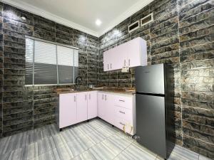Kuchyň nebo kuchyňský kout v ubytování Gabbys Suites + 3 fotografie