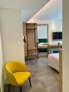 TV a/nebo společenská místnost v ubytování Hotel Locanda Alla Perla