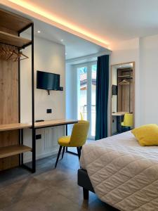 Postel nebo postele na pokoji v ubytování Hotel Locanda Alla Perla