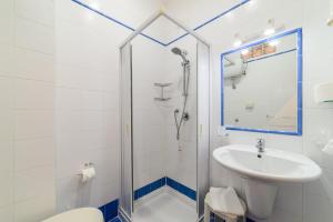 a bathroom with a shower and a sink at Hotel Tirreno in Sapri +115 photos