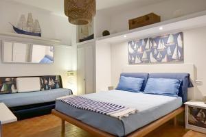 A bed or beds in a room at Depandance in Villa Gisella Még 25 kép