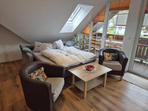 Postel nebo postele na pokoji v ubytování Penthouse Aineckblick