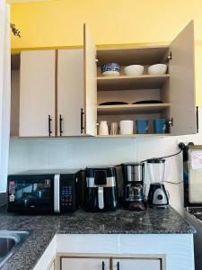 Kuchyň nebo kuchyňský kout v ubytování Rupa view Suites + 2 fotografie
