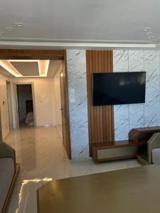 Una televisión o centro de entretenimiento en APPRT Residence Ahmed
