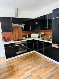A kitchen or kitchenette at Fewo-Wilhering
