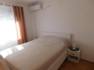 Posteľ alebo postele v izbe v ubytovaní Apartment Fontana Felicita