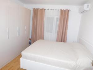 Posteľ alebo postele v izbe v ubytovaní Apartment Fontana Felicita