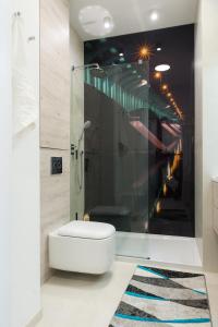 Kúpeľňa v ubytovaní Apartament Kapelanów