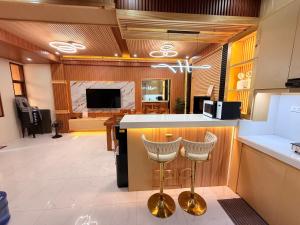Μια τηλεόραση ή/και κέντρο ψυχαγωγίας στο 5BR Brand New House for Baguio Transient