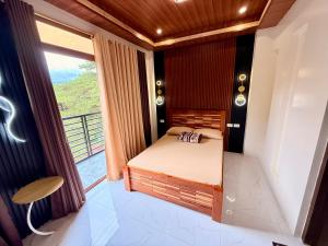 Ένα ή περισσότερα κρεβάτια σε δωμάτιο στο 5BR Brand New House for Baguio Transient
