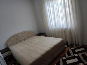 Postel nebo postele na pokoji v ubytování Apartman DB