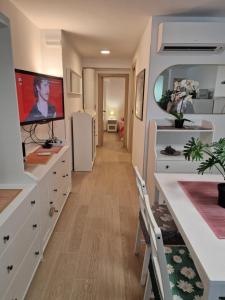 Μια τηλεόραση ή/και κέντρο ψυχαγωγίας στο Casa dell'ape Maia