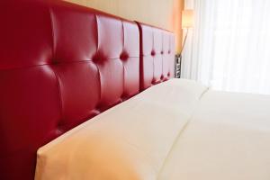 Postel nebo postele na pokoji v ubytování Victoria Hotel