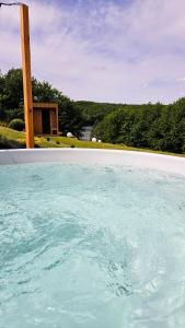 Sundlaugin á Stodoła Rzym - domek, jacuzzi, sauna, jezioro, las eða í nágrenninu