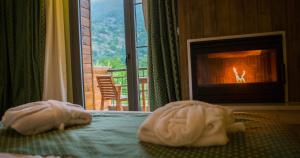 A bed or beds in a room at Irene's Resort