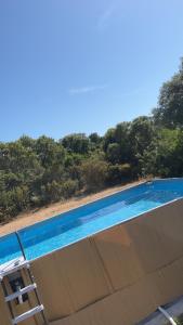Bazén v ubytovaní Camping individuel dans la maquis Corse alebo v jeho blízkosti