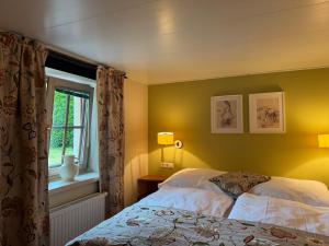 Posteľ alebo postele v izbe v ubytovaní LISIS ChaletSuite in Tonis cozy Guesthouse by Alpin Charme Apartments
