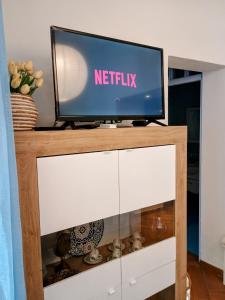 TV a/nebo společenská místnost v ubytování Seashell mare, natura e relax