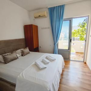 Postel nebo postele na pokoji v ubytování Apartments Hija + 18 fotografií