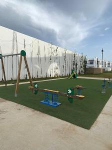 a group of play equipment in a park at Monte Cabo in Cabo Negro