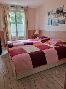 Posteľ alebo postele v izbe v ubytovaní Lyon 8 Grange Blanche Appartement calme de 50 m²