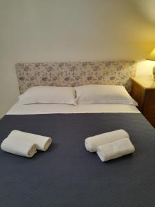 Postel nebo postele na pokoji v ubytování Malvischi Guesthouse - Garden & Pool