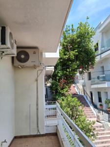 Balkón nebo terasa v ubytování Άνετο στυλάτο σπίτι στο Μικρολίμανο του Πειραιά