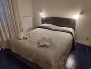 Ένα ή περισσότερα κρεβάτια σε δωμάτιο στο A Casa di Jenny