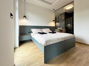 Ένα ή περισσότερα κρεβάτια σε δωμάτιο στο Apartmán Strakosch