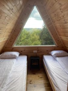 Postel nebo postele na pokoji v ubytování Komovi - Kobil Do Guesthouse