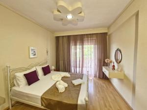 Postel nebo postele na pokoji v ubytování ENDLESS BLUE Lovely Apartment