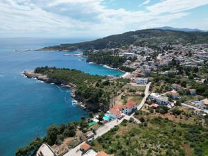 an aerial view of a town next to the ocean at Magdalini in Votsi