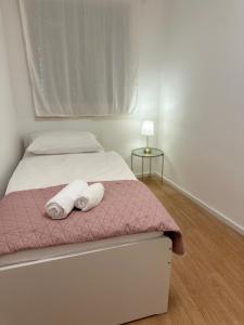 Postel nebo postele na pokoji v ubytování Apartman Obala deLuxe