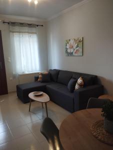 Posezení v ubytování Paeonia Apartment