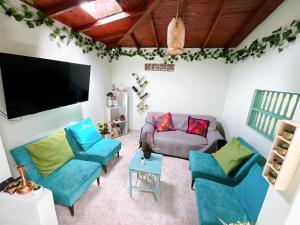 Predel za sedenje v nastanitvi Blomst Casa Hostal