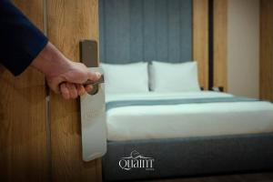 Ένα ή περισσότερα κρεβάτια σε δωμάτιο στο Quaint Hotel Erbil