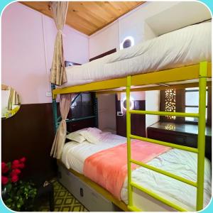 Krevet ili kreveti u jedinici u okviru objekta Prisma Hostel
