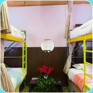 Krevet ili kreveti u jedinici u okviru objekta Prisma Hostel