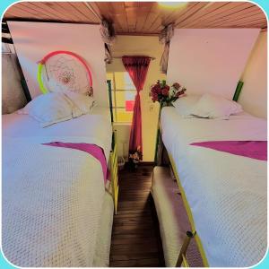Krevet ili kreveti u jedinici u okviru objekta Prisma Hostel