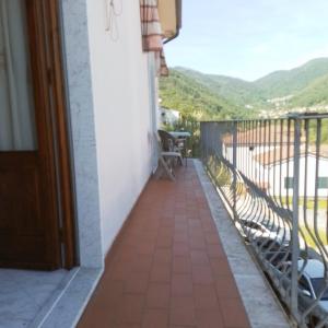 a balcony with a view of the mountains at La Collina in Riccò del Golfo di Spezia