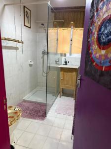 a bathroom with a shower and a sink at sunrise flats in Mellieħa
