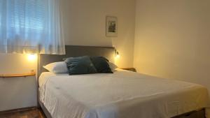 Posteľ alebo postele v izbe v ubytovaní Sepic Apartments