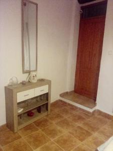 Koupelna v ubytování habitacion compartida con anfitrión