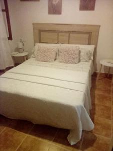 Postel nebo postele na pokoji v ubytování habitacion compartida con anfitrión