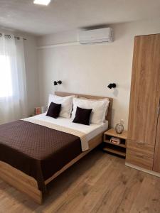 Posteľ alebo postele v izbe v ubytovaní Villa Dražana