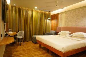 Postel nebo postele na pokoji v ubytování Hotel Surguru + 37 fotografií