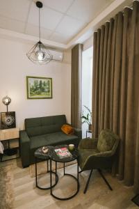 Ruang duduk di Studio apartman A Zone